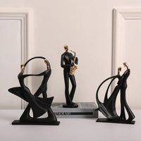 Abstract music band figure statues, resin dance sculpture crafts, suitable for TV cabinet wine cabinet study desktop decoration.